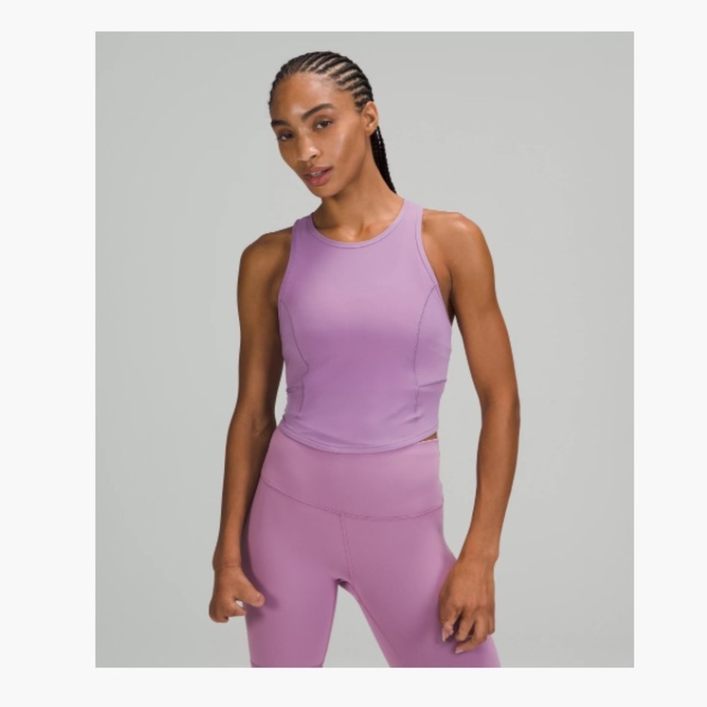 Womens Lululemon POWER THRU TANK TOP
Wisteria Purple crop top
Size4 used perfect